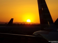 51372CrLe - Sunset, Sky Harbor Airport, Phoenix   Each New Day A Miracle  [  Understanding the Bible   |   Poetry   |   Story  ]- by Pete Rhebergen